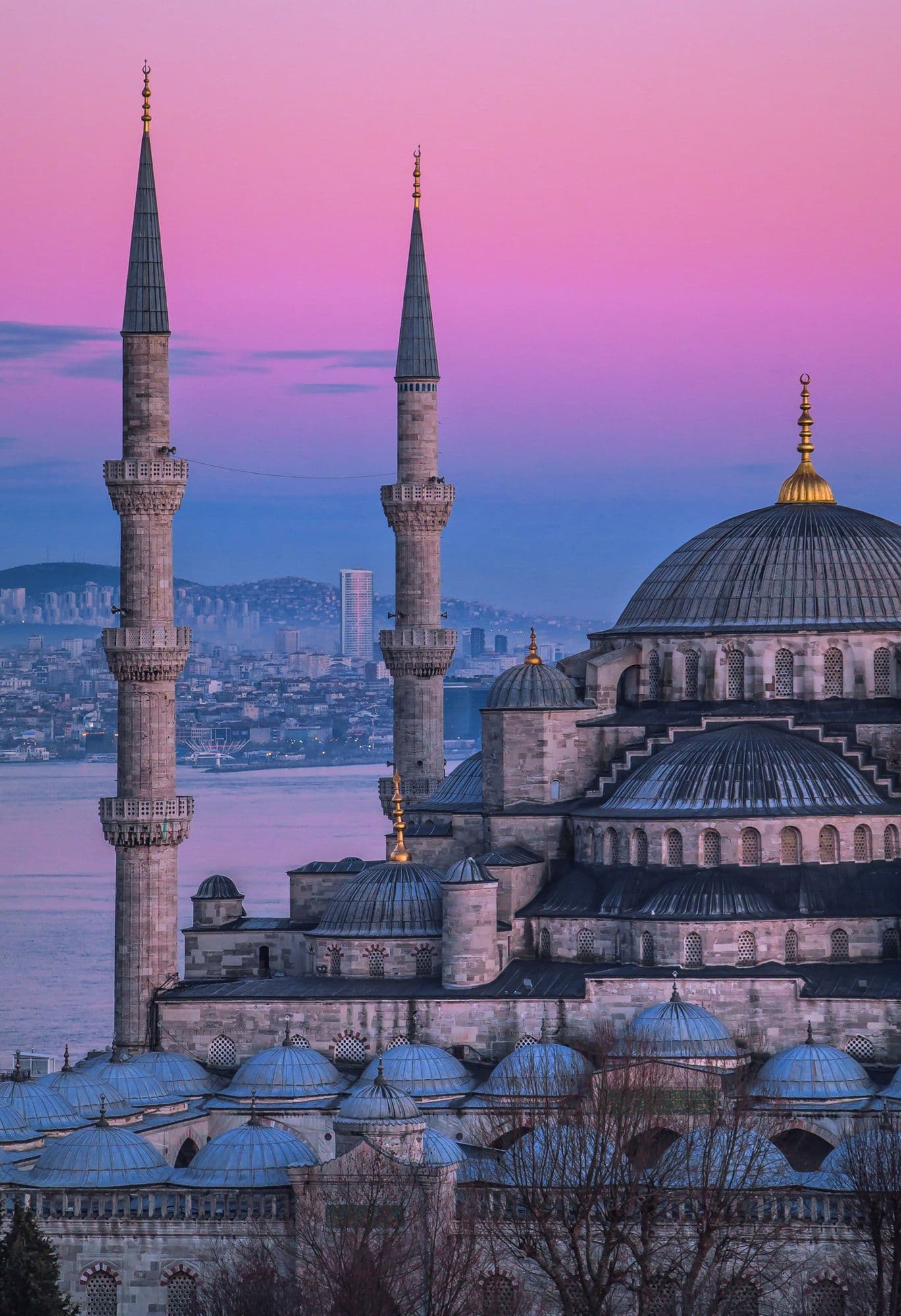 Mosque domes and minarets in Istanbul at dusk