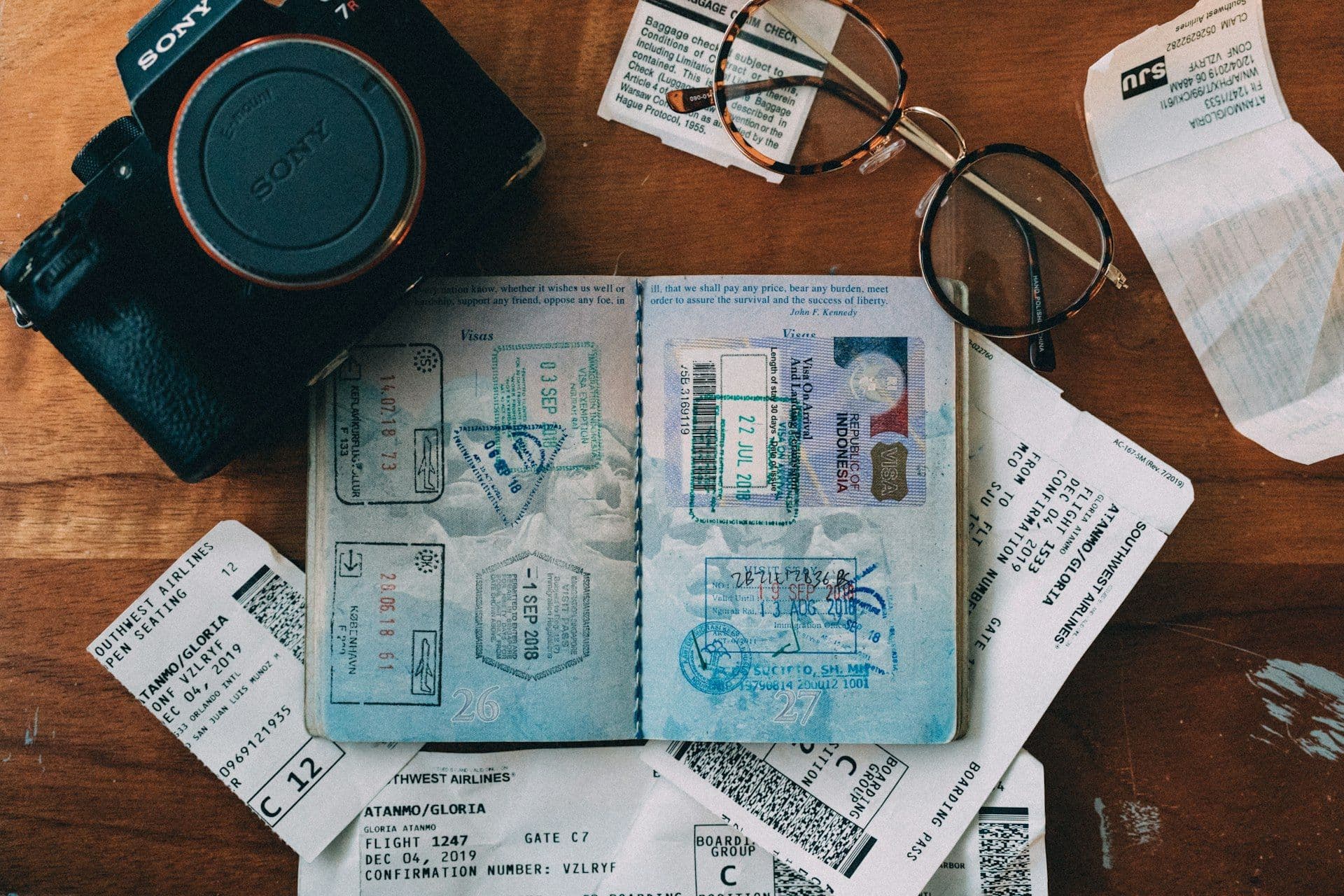 Open passport with visa stamps